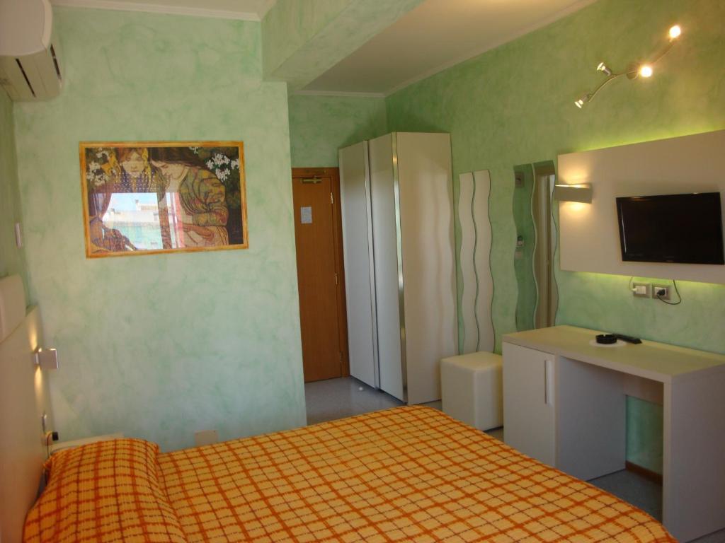 Hotel Prestigio Cesenatico Rum bild